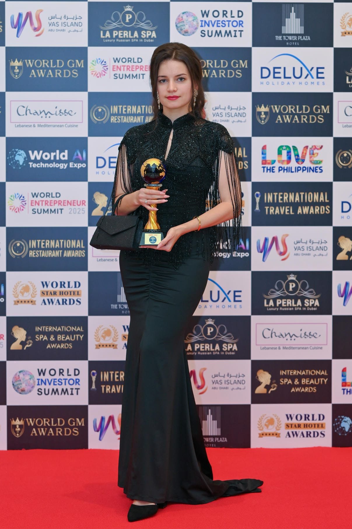 Young women leaders receiving emerging leader award at Golden Women Awards ceremony